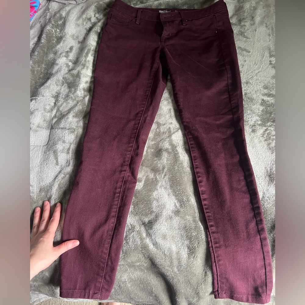 Burgundy mid rise skinny stretch jeans